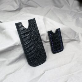 A pair of handmade leather pocket slips in black.