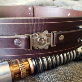 A close up of a Handmade Leather Space Wizard Belt with a flashlight.
