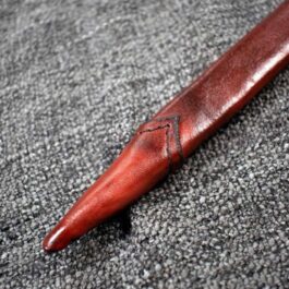 a Handmade leather Scabbard for the Albion Liechtenauer on a carpeted floor.