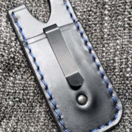 A Leather Pocket Slip for the Benchmade Tengu w' Pocket Clip with blue stitching on it.