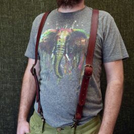 A man with a beard wearing Upgraded Leather Suspenders.