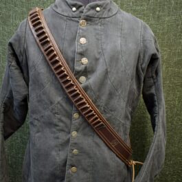 An old military uniform with a Handmade Leather Bandolier.