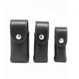 A pair of black Handmade Leather Pouches on a white background.