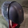 A Stitched Leather Back Of the Head Protection with a mesh covering on top of it.