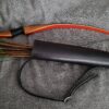 a black Basic Back Quiver laid on a cloth - renaissance clothing - renaissance clothing men - renaissance clothing women - renaissance clothing near me - renaissance costume ideas - sword baldrics - baldrics leather - baldric belt