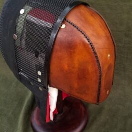 Stitched Leather Back Of the Head Protection on a wooden stand with metal accents.