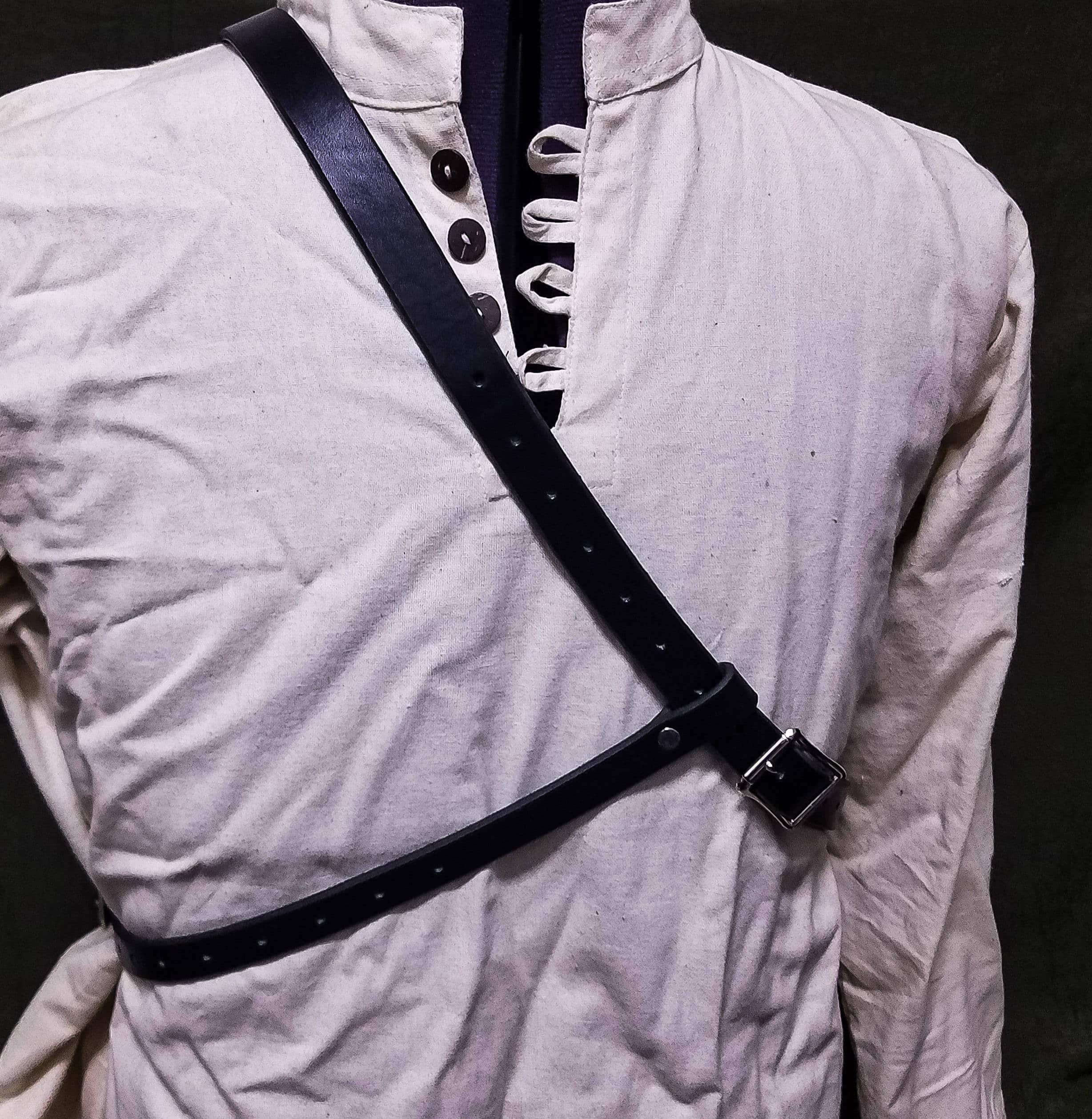 a man wearing a white shirt with a Basic Back Quiver.