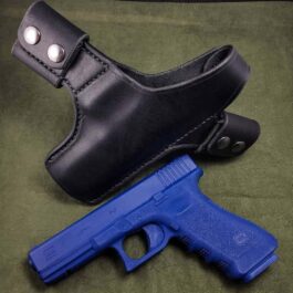 A blue gun and a black Handmade Leather Snap Loop Pancake Holster.