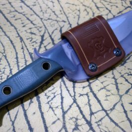 a Scout Style Benchmade Bushcrafter Sheath Style 2 knife with a brown handle.
