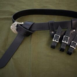 a black leather belt with three matching buckles.