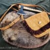 brown Frontier Suede Saddlebag laid on a cloth - renaissance clothing - renaissance clothing men - renaissance clothing women - renaissance clothing near me - renaissance art clothing - renaissance era clothing - renaissance costume ideas