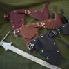 Three Handmade Leather Gorget Style 1 with a sword.