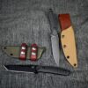 a couple of Kydex Sheaths for the Benchmade Protagonist sitting next to each other.