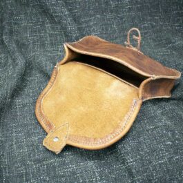 A Ranger Belt Pouch sitting on top of a blue cloth.