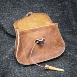 A Ranger Belt Pouch sitting on top of a black cloth.