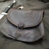 black Ranger Belt Pouch laid on a cloth - renaissance clothing - renaissance clothing men - renaissance clothing women - renaissance clothing near me - renaissance art clothing - renaissance era clothing - renaissance costume ideas