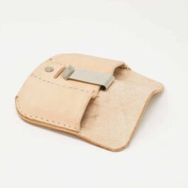 a 1911 IWB Double Magpouch with a metal clip on it.