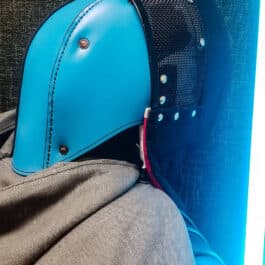 Stitched Leather Back Of the Head Protection sitting on top of a person's back.