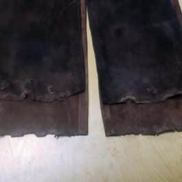 close up of the bottom part of a Suede Strider Jerkin on a mannequin - renaissance clothing - renaissance clothing men - renaissance clothing women - renaissance clothing near me - renaissance art clothing - renaissance era clothing - renaissance costume ideas