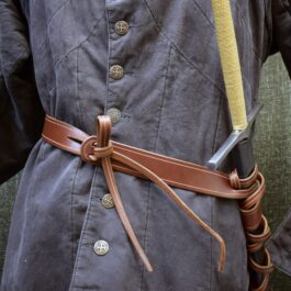 A person wearing an Integrated Sword Belt.