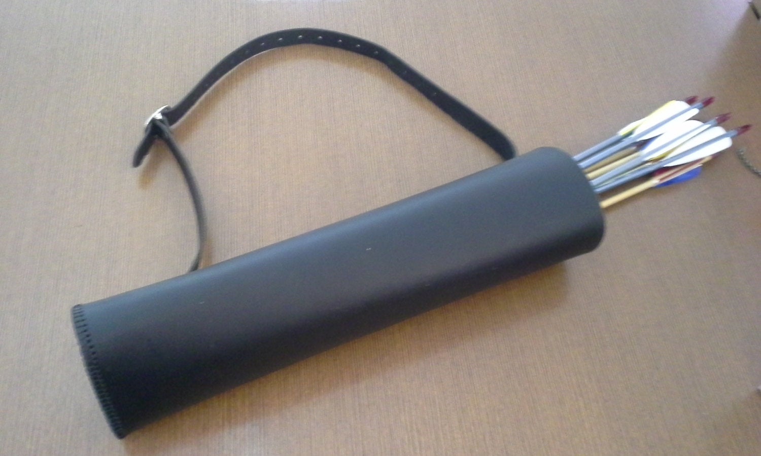 a Basic Back Quiver sitting on top of a table.