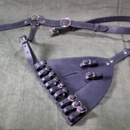 a piece of leather with a harness attached to it.