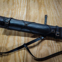 A Ranger Back Quiver sitting on top of a wooden table.