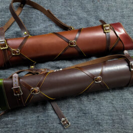 dark brown with green, light brown with burgundy, both with dark brown straps.