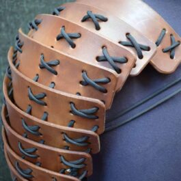 A close up of Samurai Style Shoulder Armor on a mannequin.