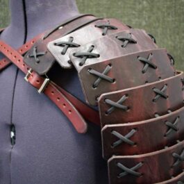 A close up of Samurai Style Shoulder Armor on a mannequin.