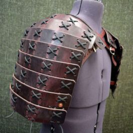 A mannequin with Samurai Style Shoulder Armor on it.