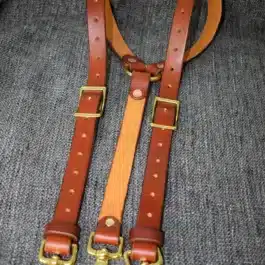 A pair of Lumberjack Suspenders with brass hardware.