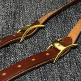 a pair of Lumberjack Suspenders with brass hardware.