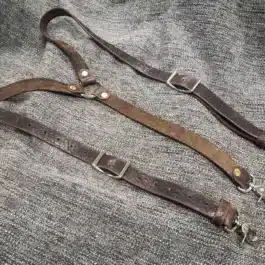 Bison Leather Suspenders laid on a cloth - renaissance clothing - renaissance clothing men - renaissance clothing women - renaissance clothing near me - renaissance art clothing - renaissance era clothing - renaissance costume ideas