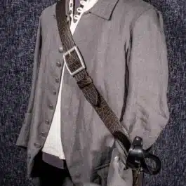 A bison leather baldric on display in a museum.