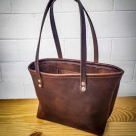 a dark brown bison tote
