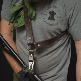 Man with a beard wearing a grey shirt and a leather single point sling - Grommet's Leathercraft - renaissance clothing - renaissance art clothing - renaissance era clothing - leathercraft supplies - leathercraft accessories - leathercraft store near me - quality leather craft