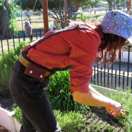 a young woman and her forage pouch
