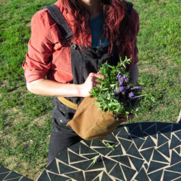 a young woman and her forage pouch
