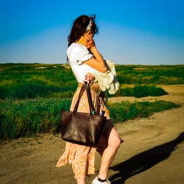 a young woman and her bison tote