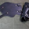 A pair of Mirkwood Vambraces laying on top of a bed.