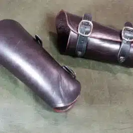 A pair of Mirkwood Vambraces sitting on top of a table.