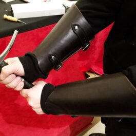 a person wearing the Mirkwood Vambraces on their arms.