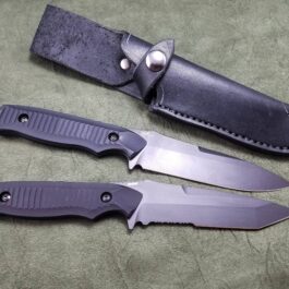 A handmade leather sheath for the Benchmade Nimravus/Protagonist sitting on top of a table.