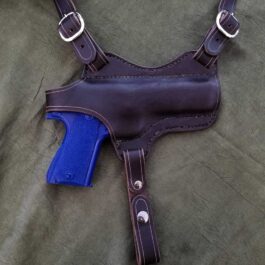 A Shoulder Holster For Full Size 1911 with a blue gun in it.