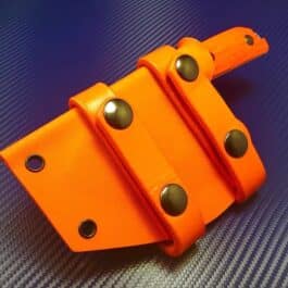 a close up of a Kydex Sheath for the Benchmade Nestucca Cleaver on a table.
