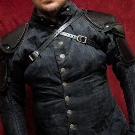 A man wearing Leather Shoulder Armor Style 2 and a hat.
