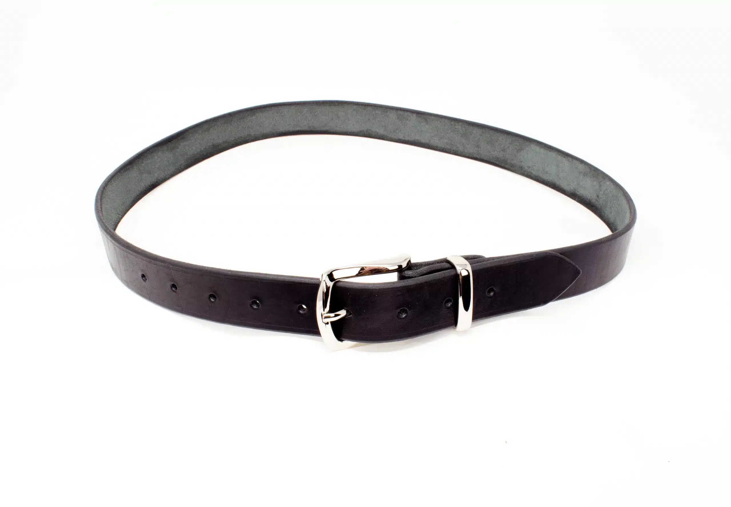 A Handmade Leather Dress Belt with a silver buckle on a white background.