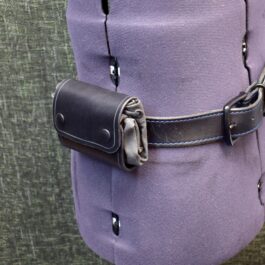 a Waxed Canvas Bushcraft Foraging/Dump Pouch with a black leather belt.