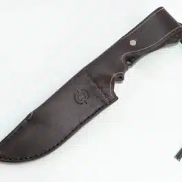 A TOPs Longhorn Bowie knife with a Handmade Leather Sheath on a white background.